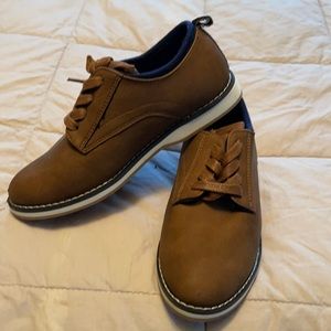 Brown boy’s dress shoe